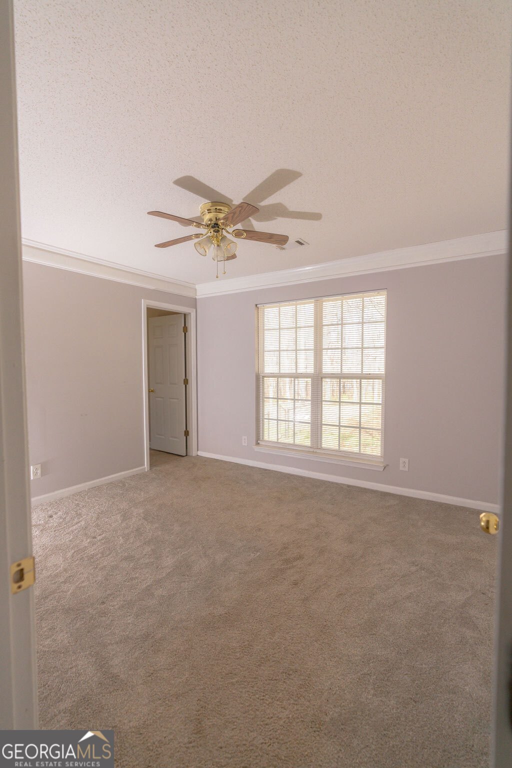 211 Sunfish Trail Southwest Eatonton, GA 31024 - Photo 24 of 40 a view of an empty room with a window
