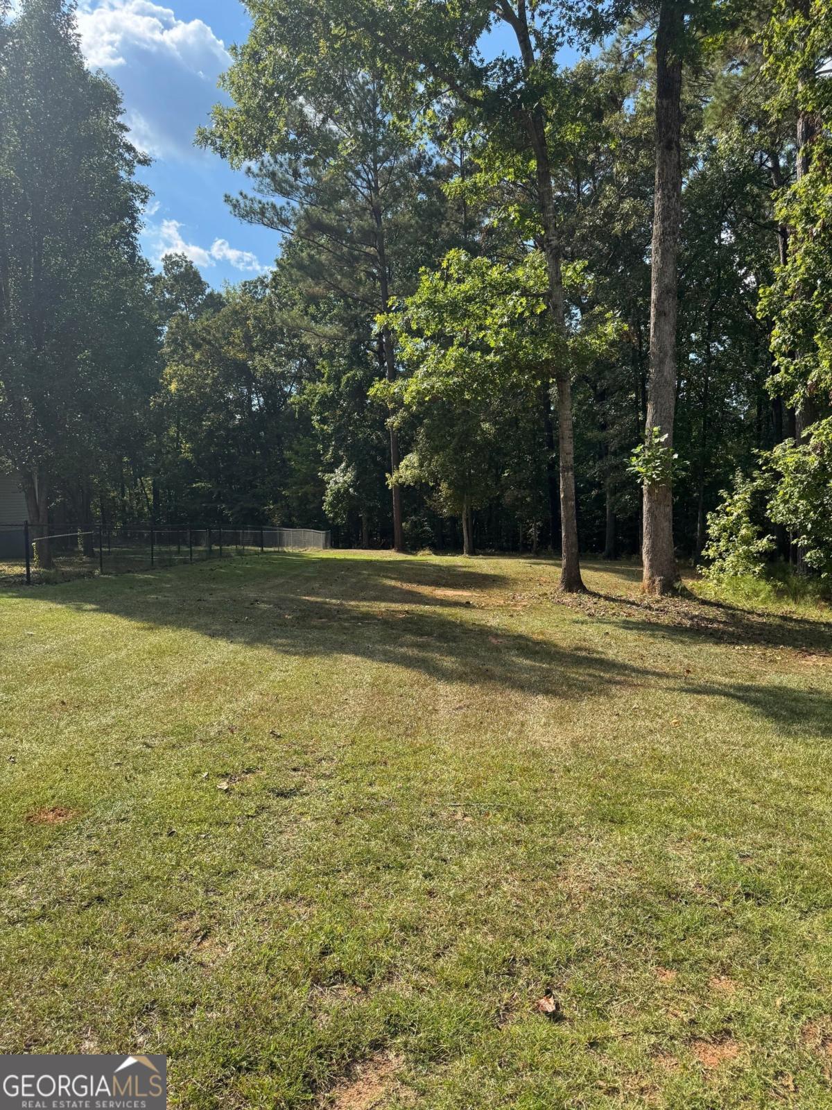 211 Sunfish Trail Southwest Eatonton, GA 31024 - Photo 39 of 40 a view of a swimming pool with an outdoor space