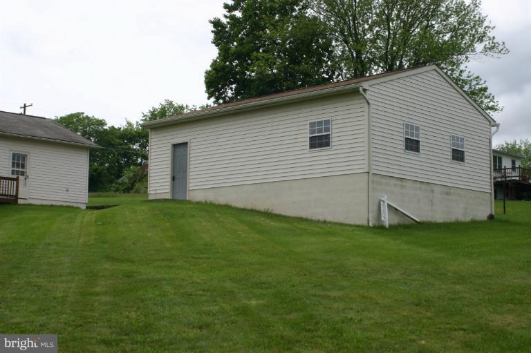 8422 Edgewood Church Road Frederick, MD 21702 - Photo 5 of 17 a view of a backyard with a garden