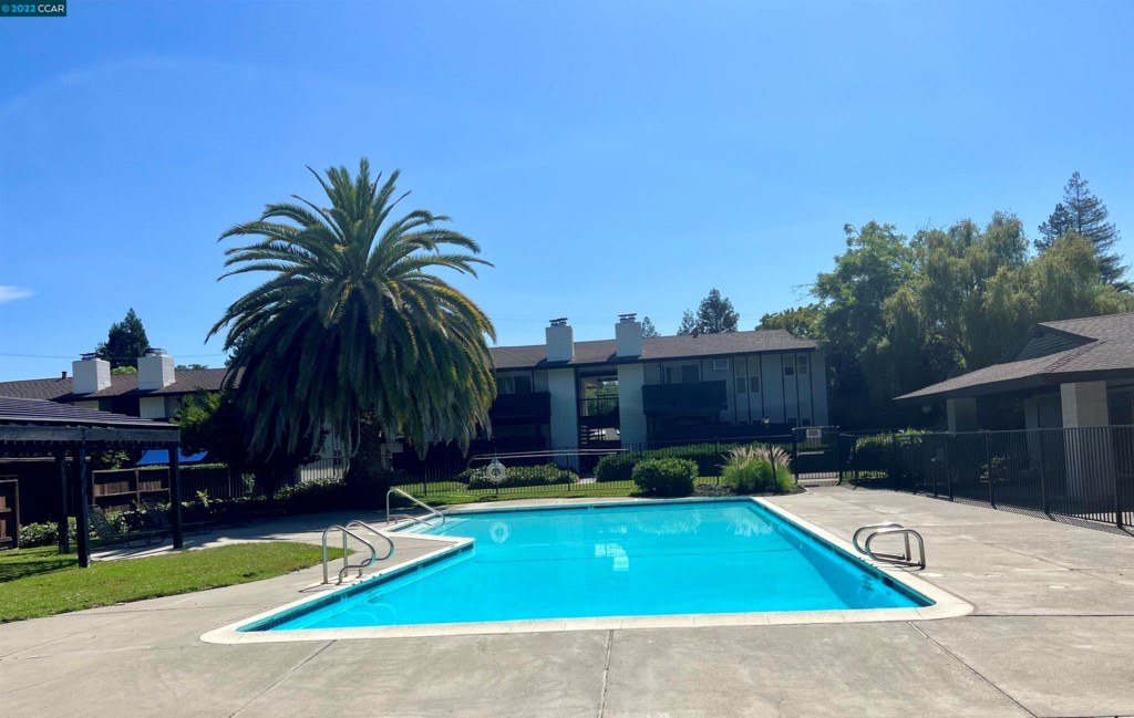 2060 Camel Lane Walnut Creek, CA 94596 - Photo 30 of 33 a view of swimming pool outdoor seating and yard