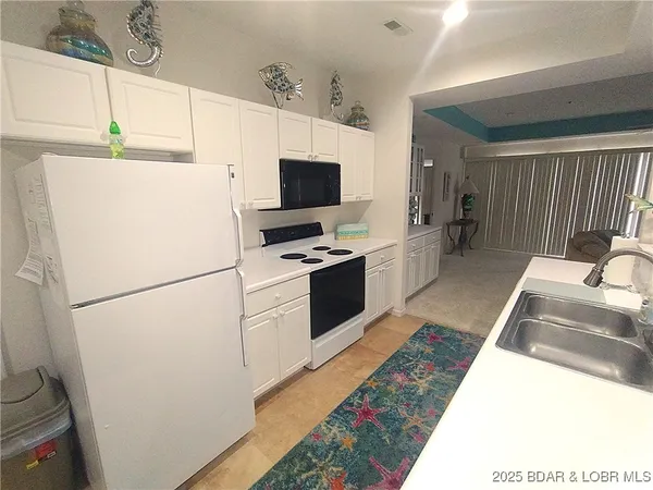 $369,000 | 910 Harbour Towne Drive, Unit E910, Lake Ozark, MO 65049