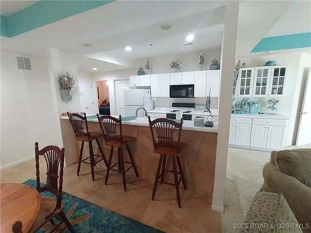 $369,000 | 910 Harbour Towne Drive, Unit E910, Lake Ozark, MO 65049