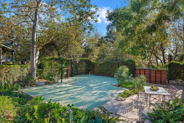a view of swimming pool with chairs