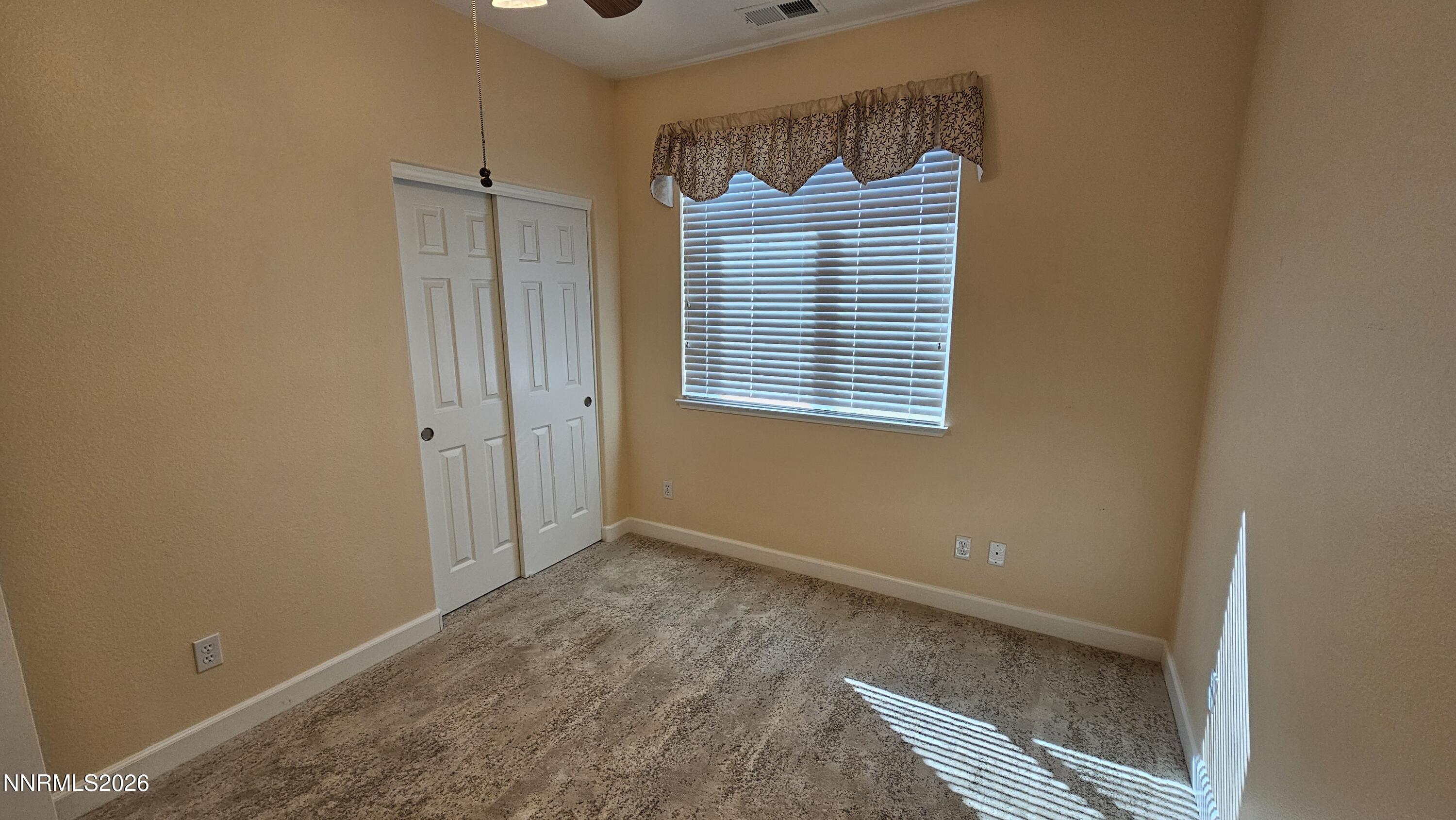 3933 Border Court Reno, NV 89508 - Photo 20 of 36 a view of an empty room with a window