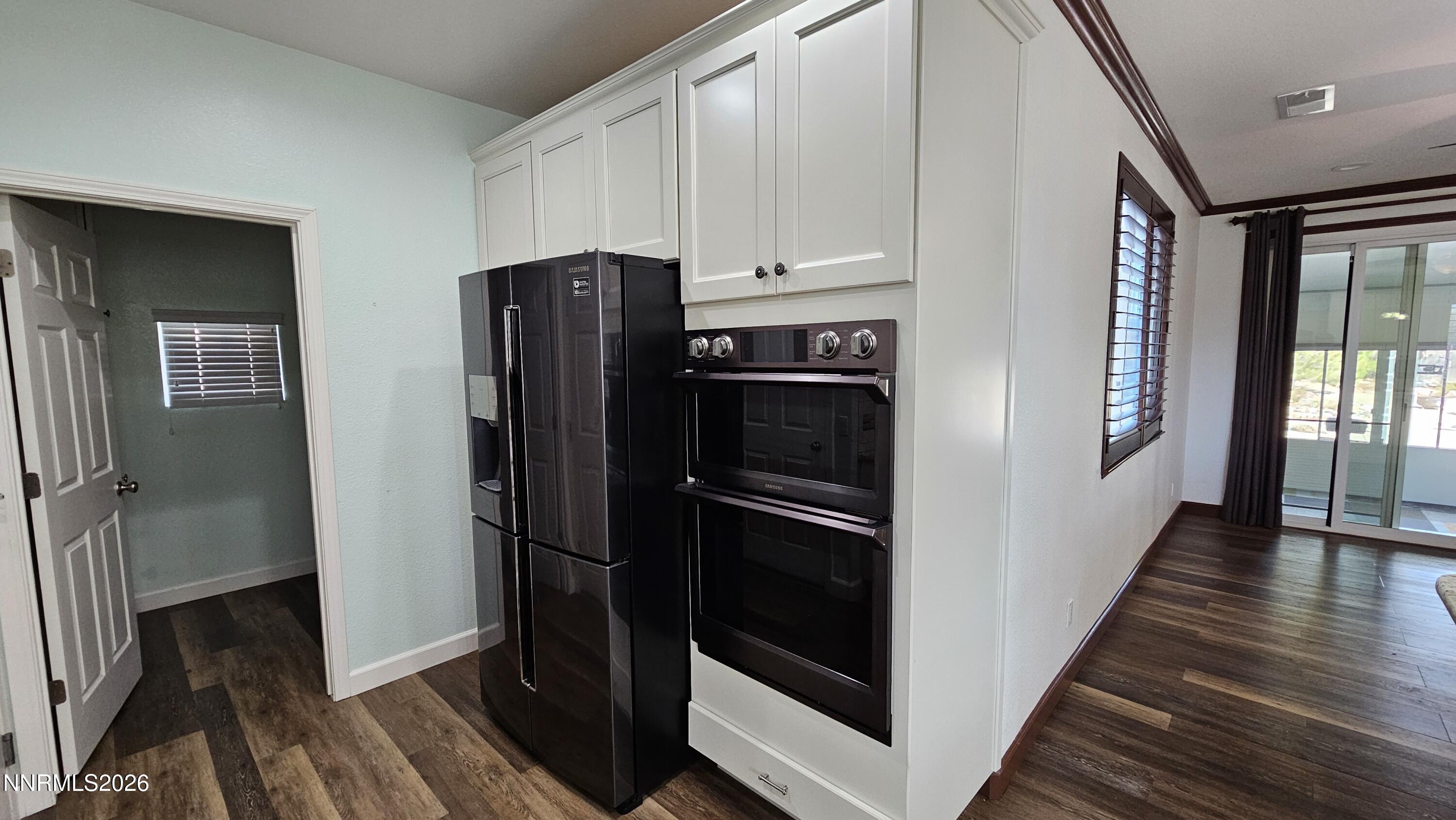 3933 Border Court Reno, NV 89508 - Photo 6 of 36 a kitchen with stainless steel appliances and refrigerator