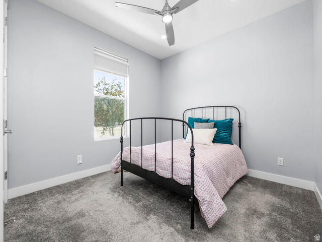 877 South Yarrow Drive Mapleton, UT 84664 - Photo 15 of 46 Neutral gray walls complement the textured gray carpet flooring
