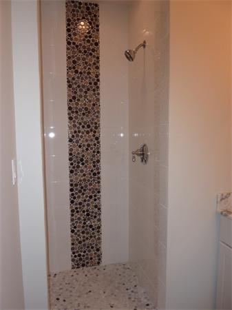 447 Washington Street, Unit 3 Brookline, MA 02446 - Photo 13 of 20 a bathroom with a shower curtain