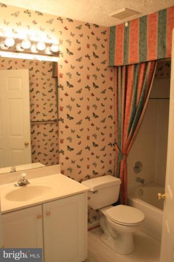 9502 Bellhaven Court Frederick, MD 21701 - Photo 17 of 24 a bathroom with a sink toilet and shower