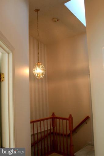 9502 Bellhaven Court Frederick, MD 21701 - Photo 20 of 24 a view of a hallway with windows