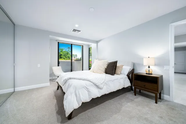 a view of a yard with furniture