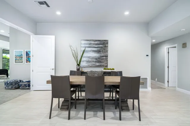 a view of a dining room with furniture
