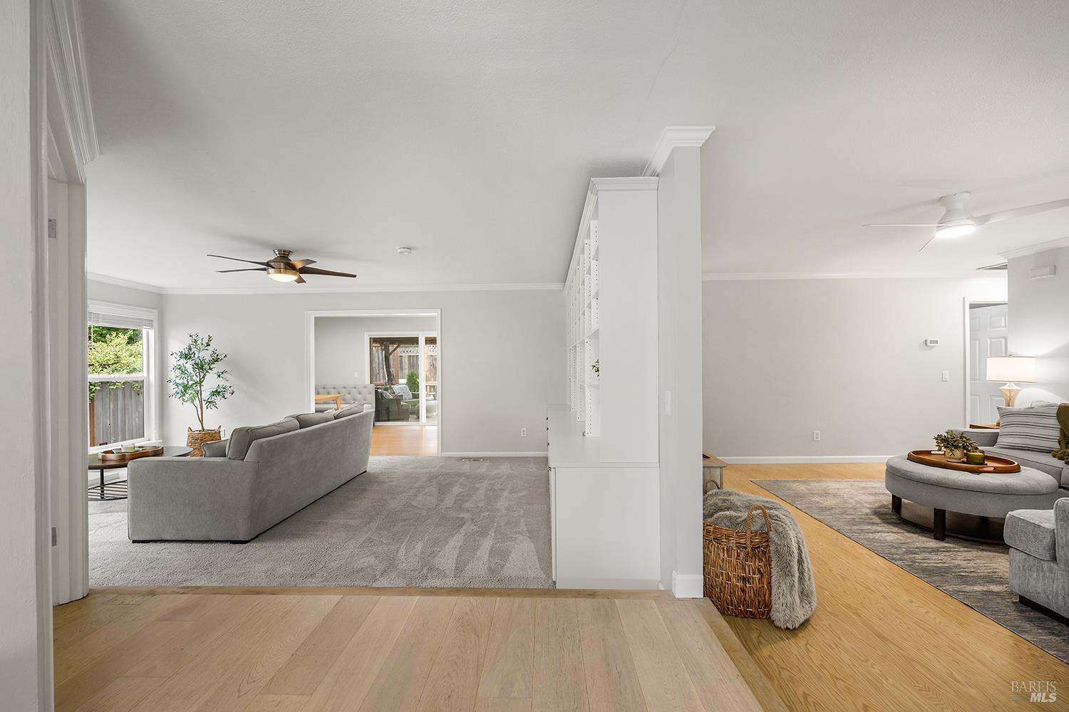 5313 Yerba Buena Road Santa Rosa, CA 95409 - Photo 32 of 34 The thoughtful floor plan welcomes you with the family room featuring a fireplace and built-in bookshelves to the left, while the living room is situated to the right.