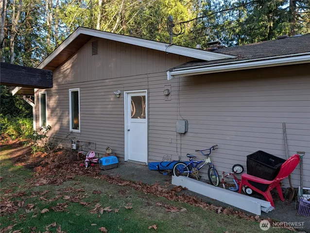 a backyard of a house with seating space