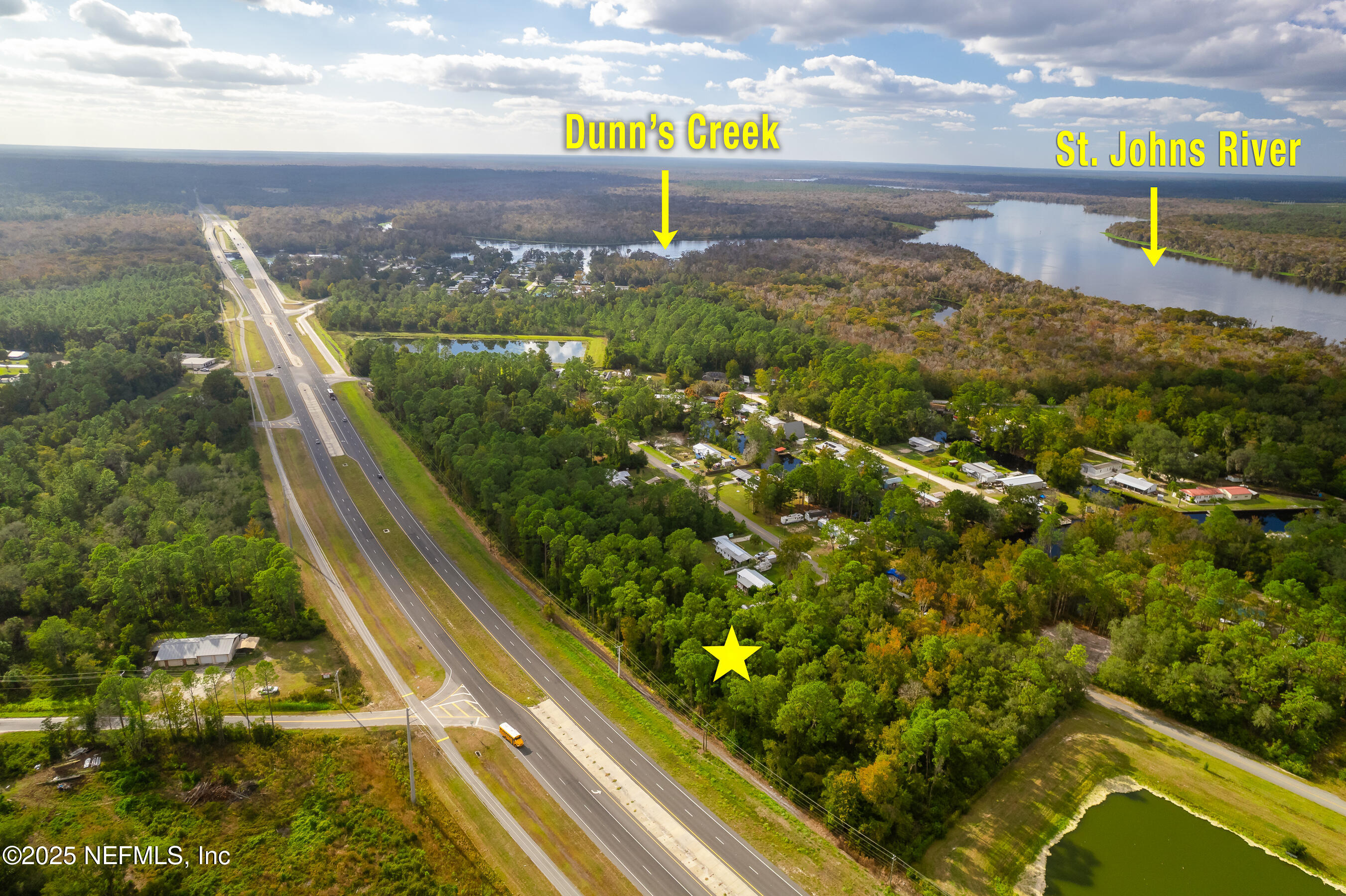 127 Landmark Avenue Satsuma, FL 32189 - Photo 12 of 14 a view of a yard with a lake view