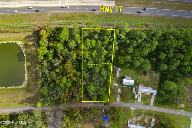 a view of a yard with an outdoor space