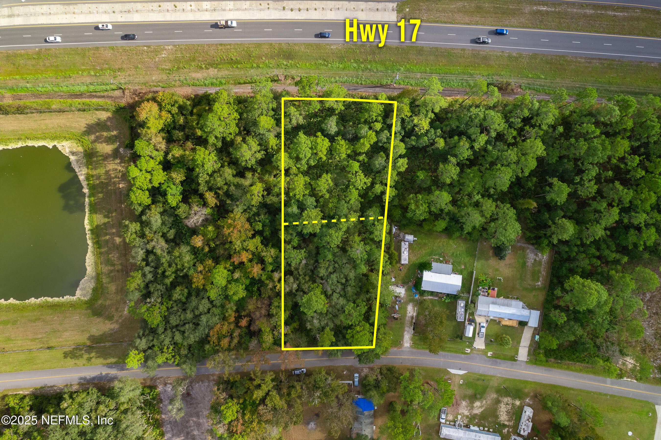 127 Landmark Avenue Satsuma, FL 32189 - Photo 5 of 14 a view of a yard with an outdoor space