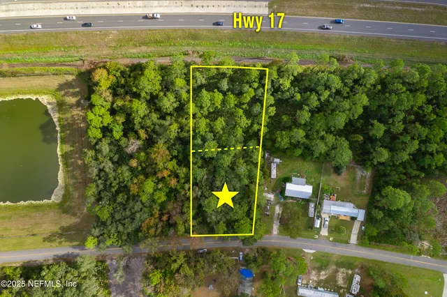 a view of a yard with an outdoor seating