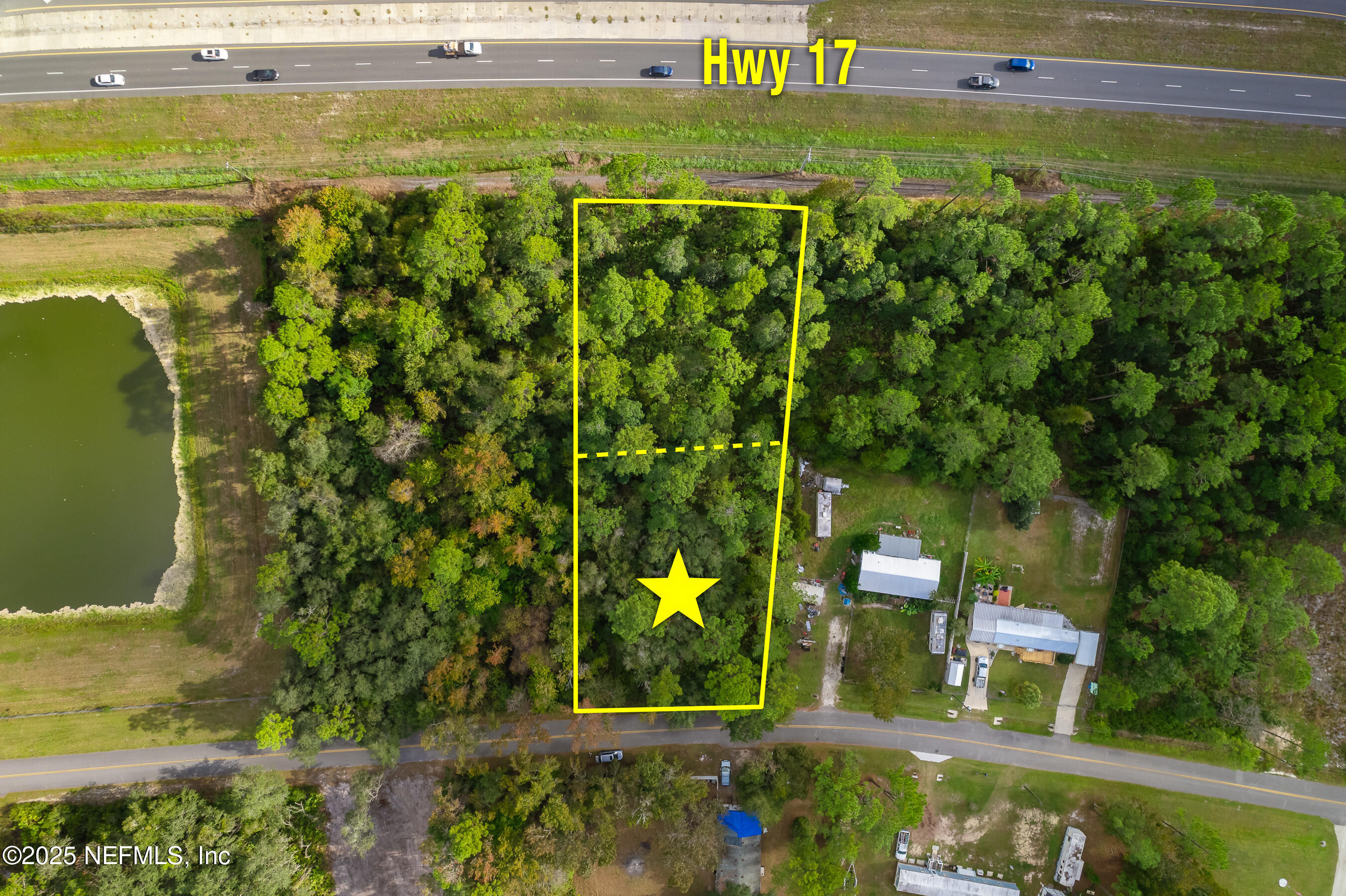 127 Landmark Avenue Satsuma, FL 32189 - Photo 6 of 14 a view of a yard with an outdoor seating