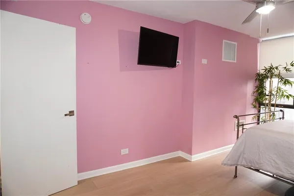 a view of livingroom with furniture and a flat screen tv