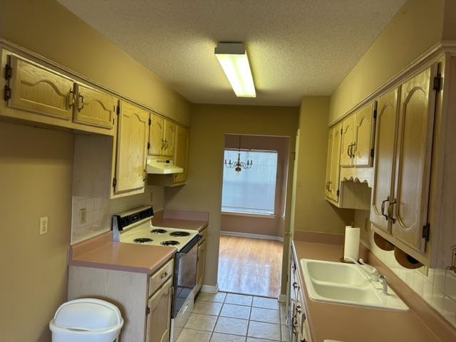 7764 Reese Road Memphis, TN 38133 - Photo 2 of 12 a bathroom with a sink a toilet and mirror