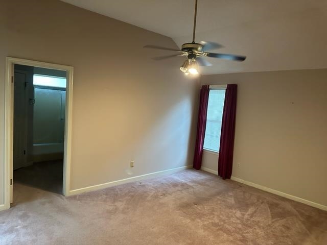 7764 Reese Road Memphis, TN 38133 - Photo 7 of 12 an empty room with closet and a chandelier fan