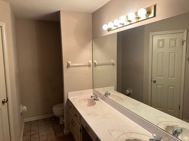 7764 Reese Road Memphis, TN 38133 - Photo 10 of 12 a bathroom with a sink vanity and a mirror