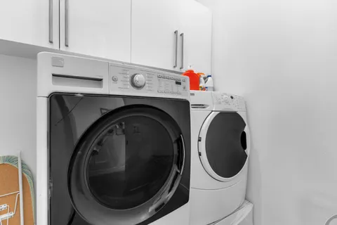 a view of a backyard with tub