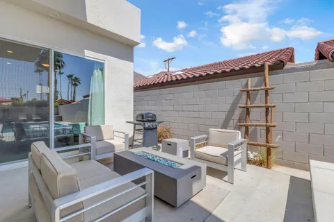 a view of yard with seating area