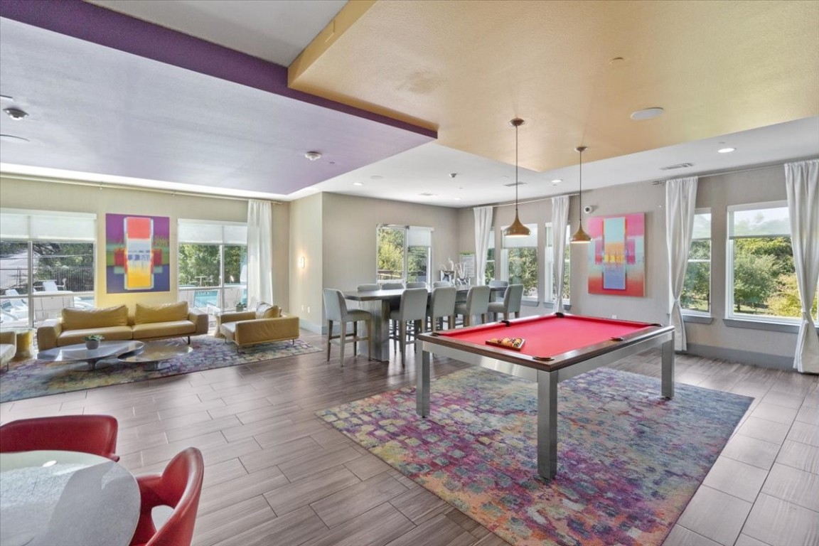1900 Barton Springs Road, Unit 5001 Austin, TX 78704 - Photo 29 of 34 a room with furniture pool table and glass windows