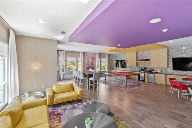 a view of a park with large trees