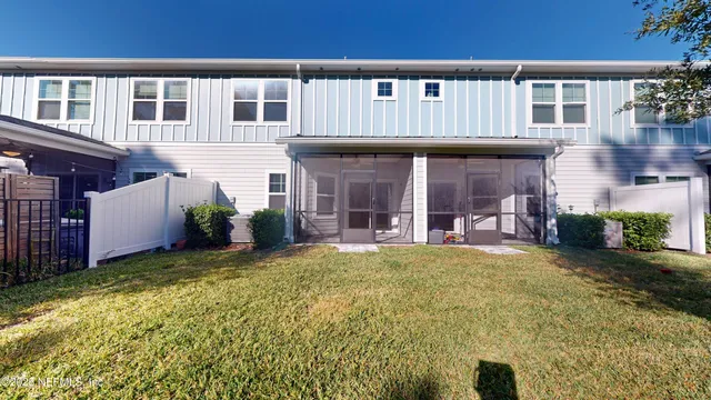 a view of a car parked in front of a house