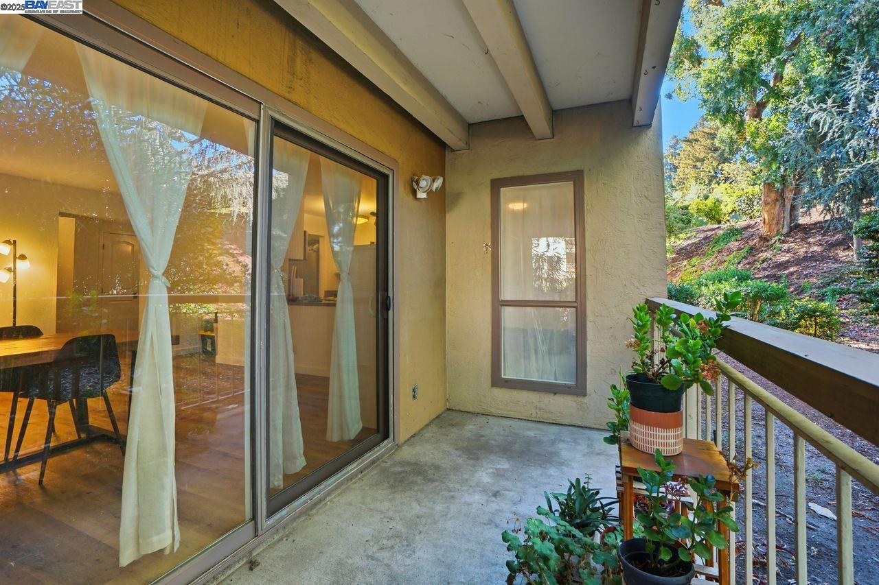 310 North Civic Drive, Unit 102 Walnut Creek, CA 94596 - Photo 18 of 39 a view of a porch with wooden floor