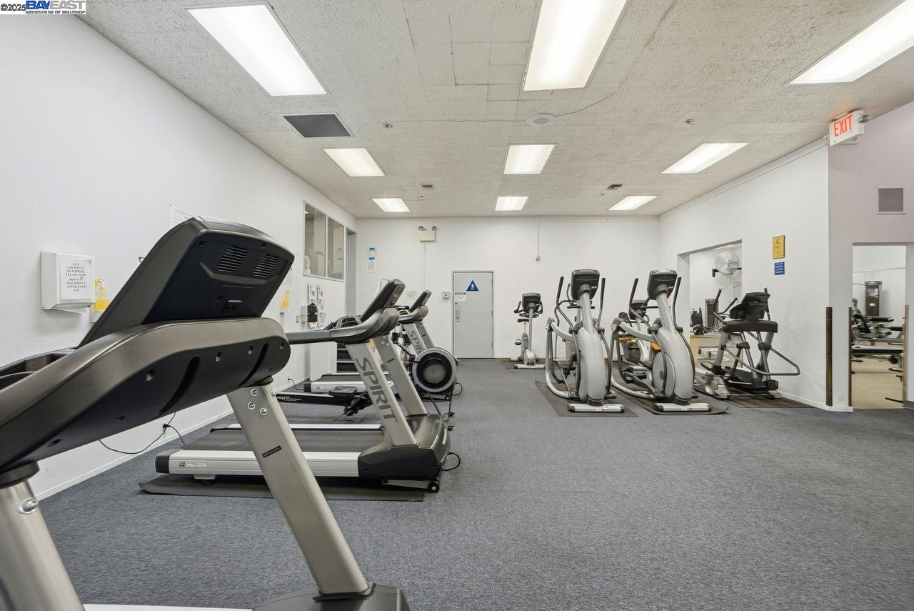 310 North Civic Drive, Unit 102 Walnut Creek, CA 94596 - Photo 21 of 39 a view of a room with gym equipment