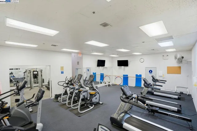 a view of a room with gym equipment