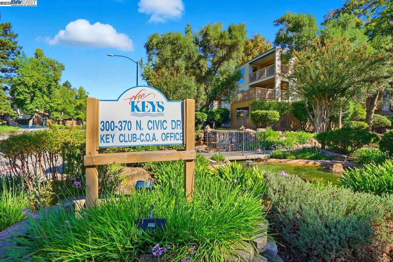 310 North Civic Drive, Unit 102 Walnut Creek, CA 94596 - Photo 31 of 39 a sign on the side of the road