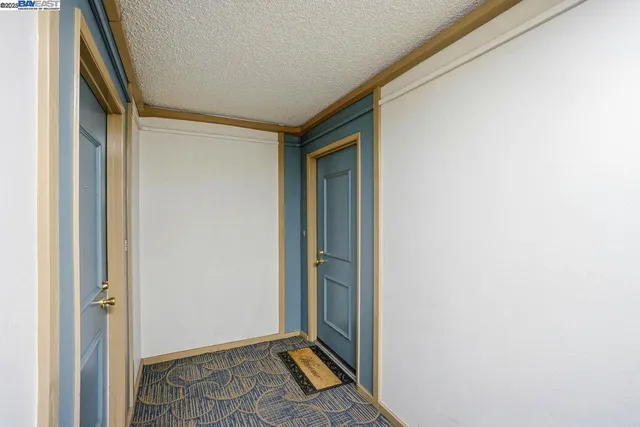 a kitchen with a stove and a microwave