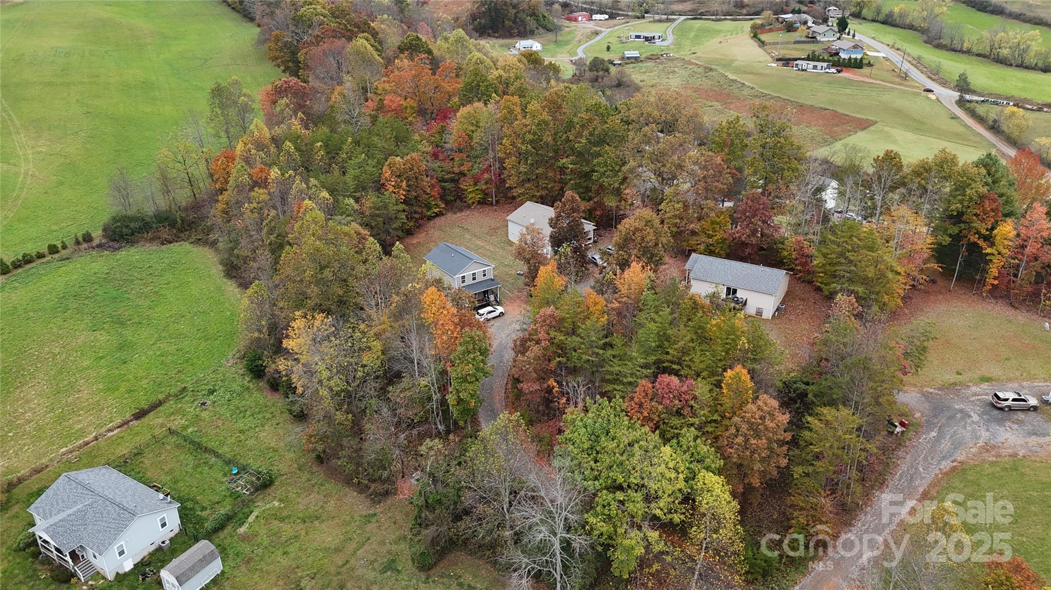 117 Tomato Town Road Leicester, NC 28748 - Photo 2 of 6 an aerial view of residential houses with outdoor space