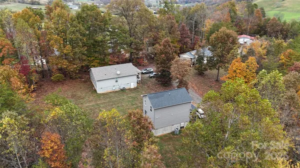 an aerial view of residential house with outdoor space