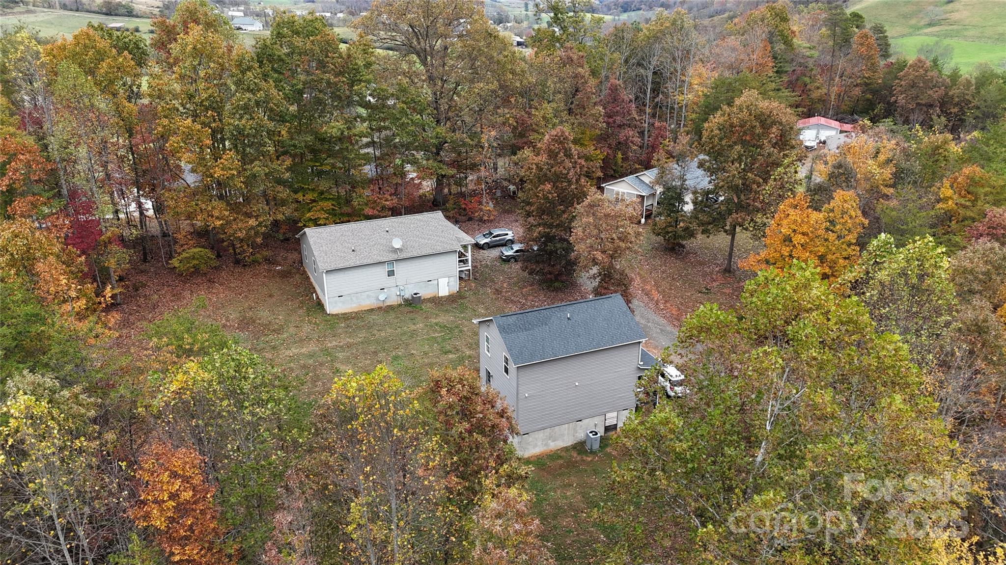 117 Tomato Town Road Leicester, NC 28748 - Photo 5 of 6 an aerial view of residential house with outdoor space