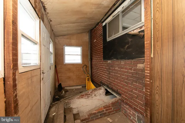 a bathroom with a sink and a window