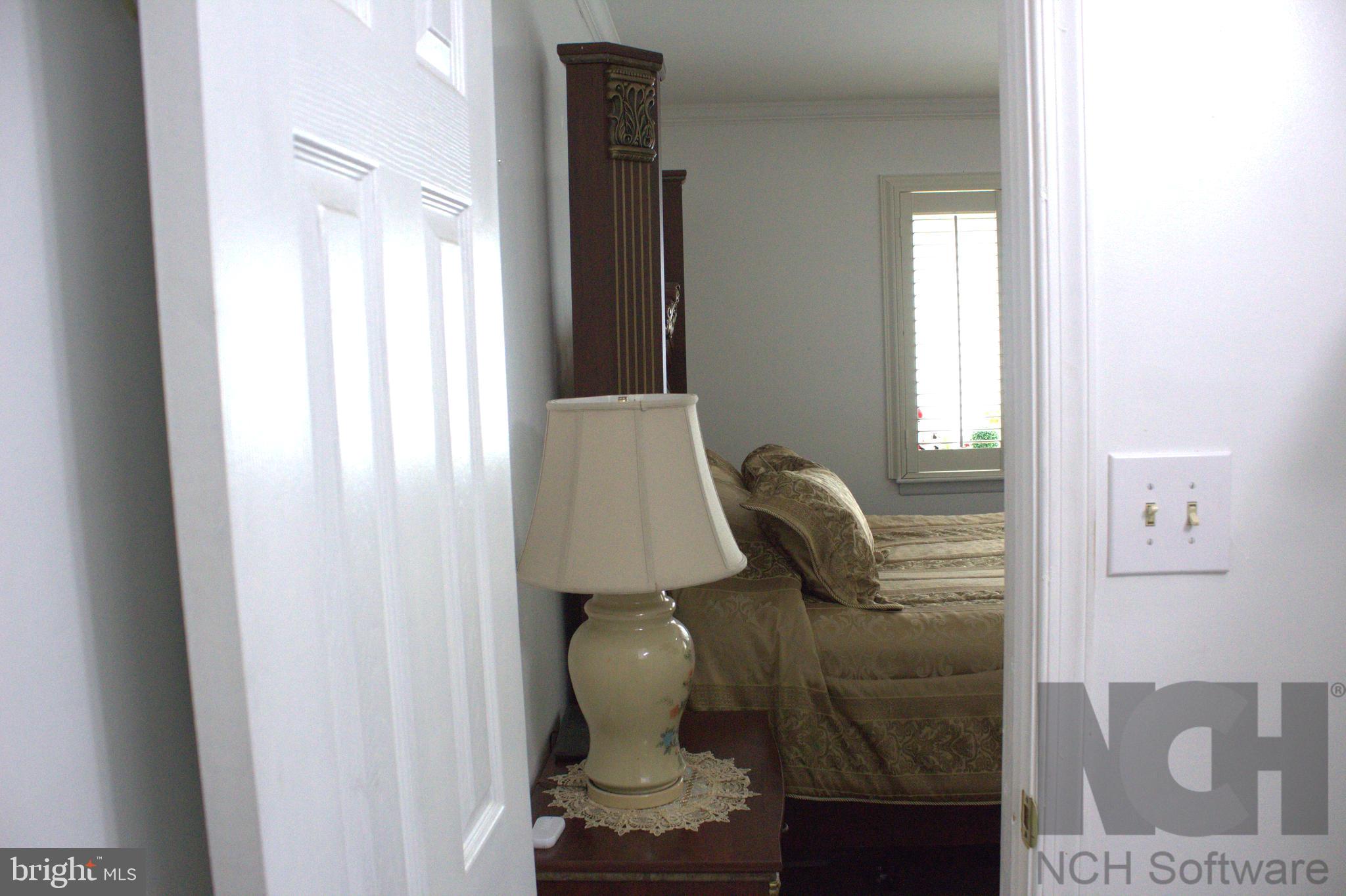 1902 Valley Terrace Southeast Washington, DC 20032 - Photo 11 of 33 a view of hallway with furniture and a window