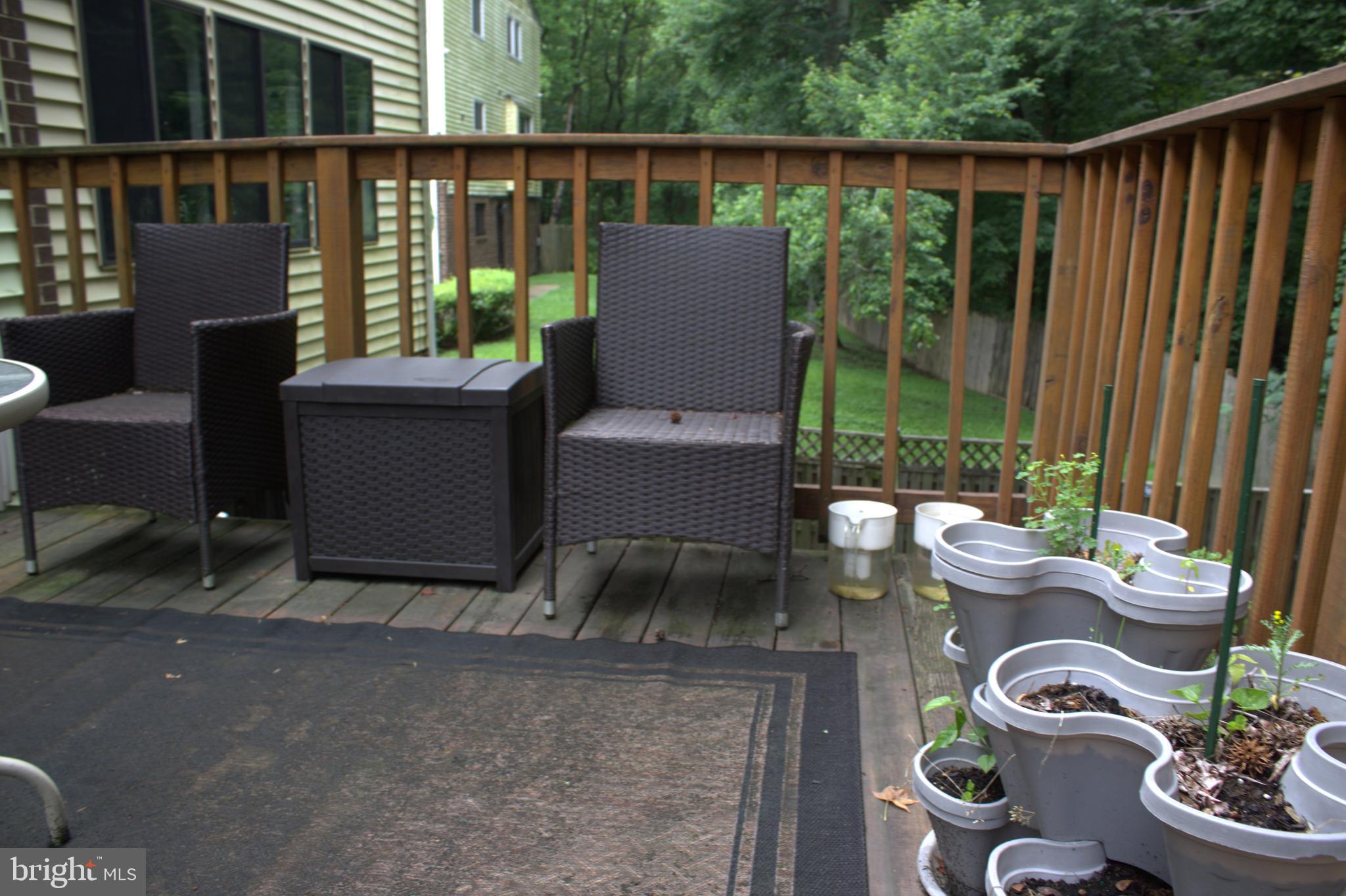 1902 Valley Terrace Southeast Washington, DC 20032 - Photo 31 of 33 a view of a patio with couches chairs and potted plants