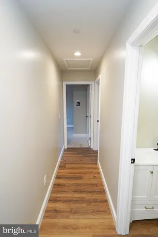 a view of a bathroom with a sink and mirror