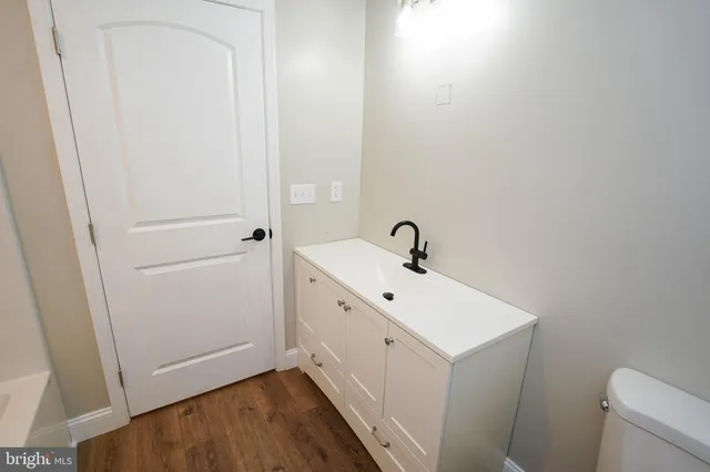 a bathroom with a sink and a toilet
