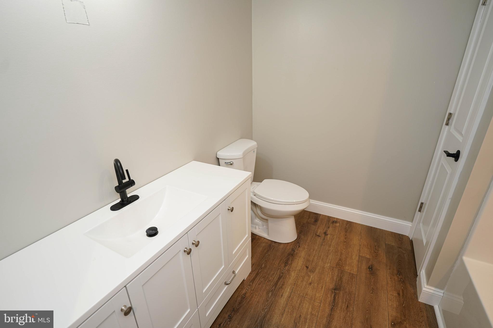 4206 Jacksonville Road Crisfield, MD 21817 - Photo 22 of 34 a bathroom with a sink and a toilet
