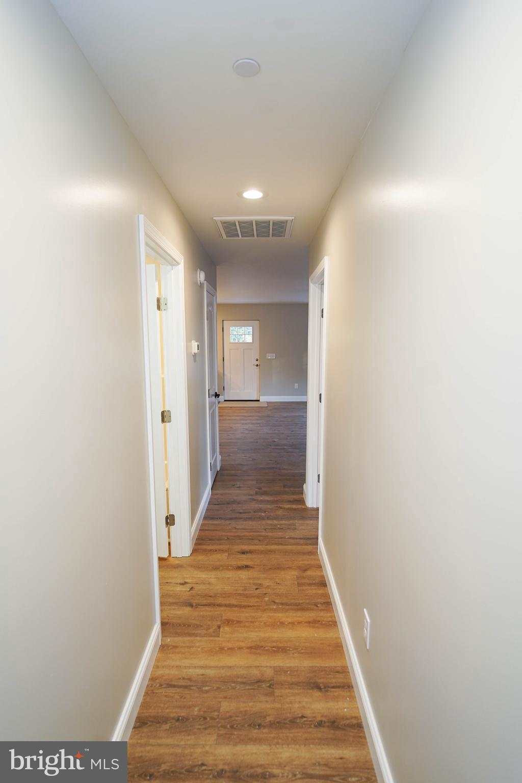4206 Jacksonville Road Crisfield, MD 21817 - Photo 24 of 34 a view of a hallway with wooden floor