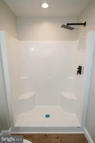 a view of a white house in front of a house