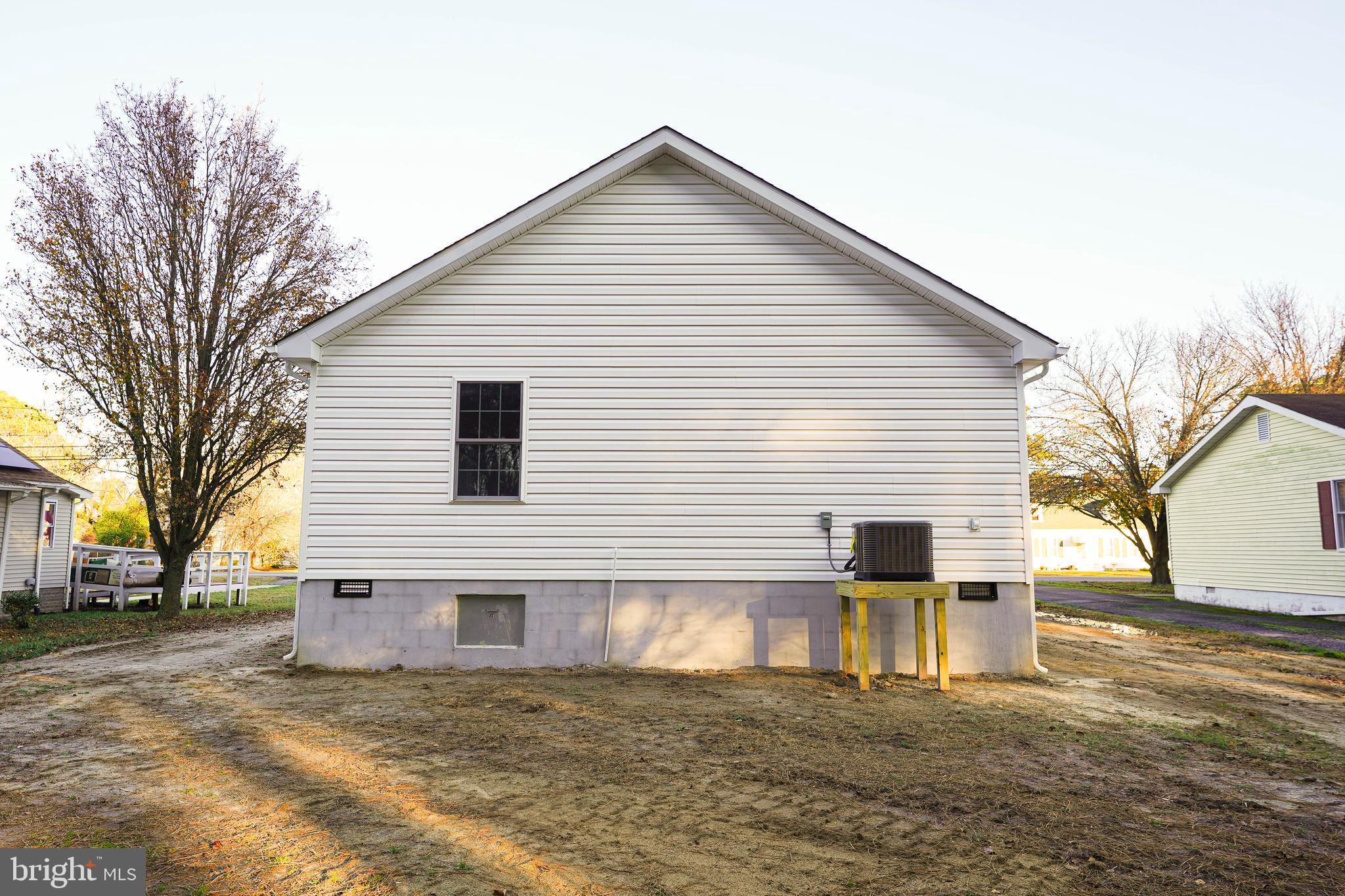 4206 Jacksonville Road Crisfield, MD 21817 - Photo 32 of 34 a view of a white house in front of a house