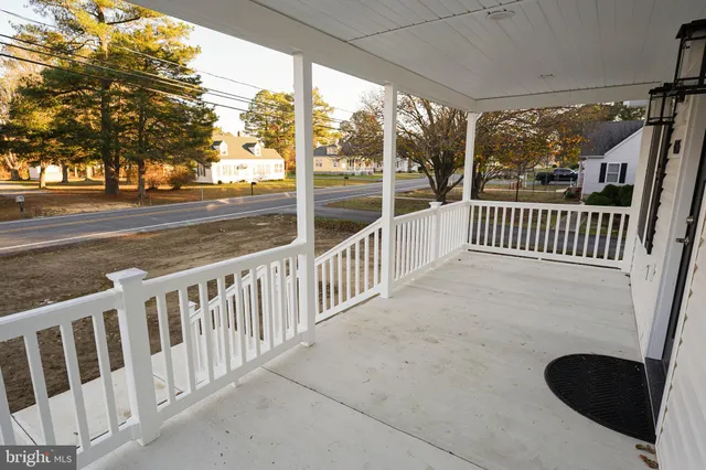 a view of balcony with furniture