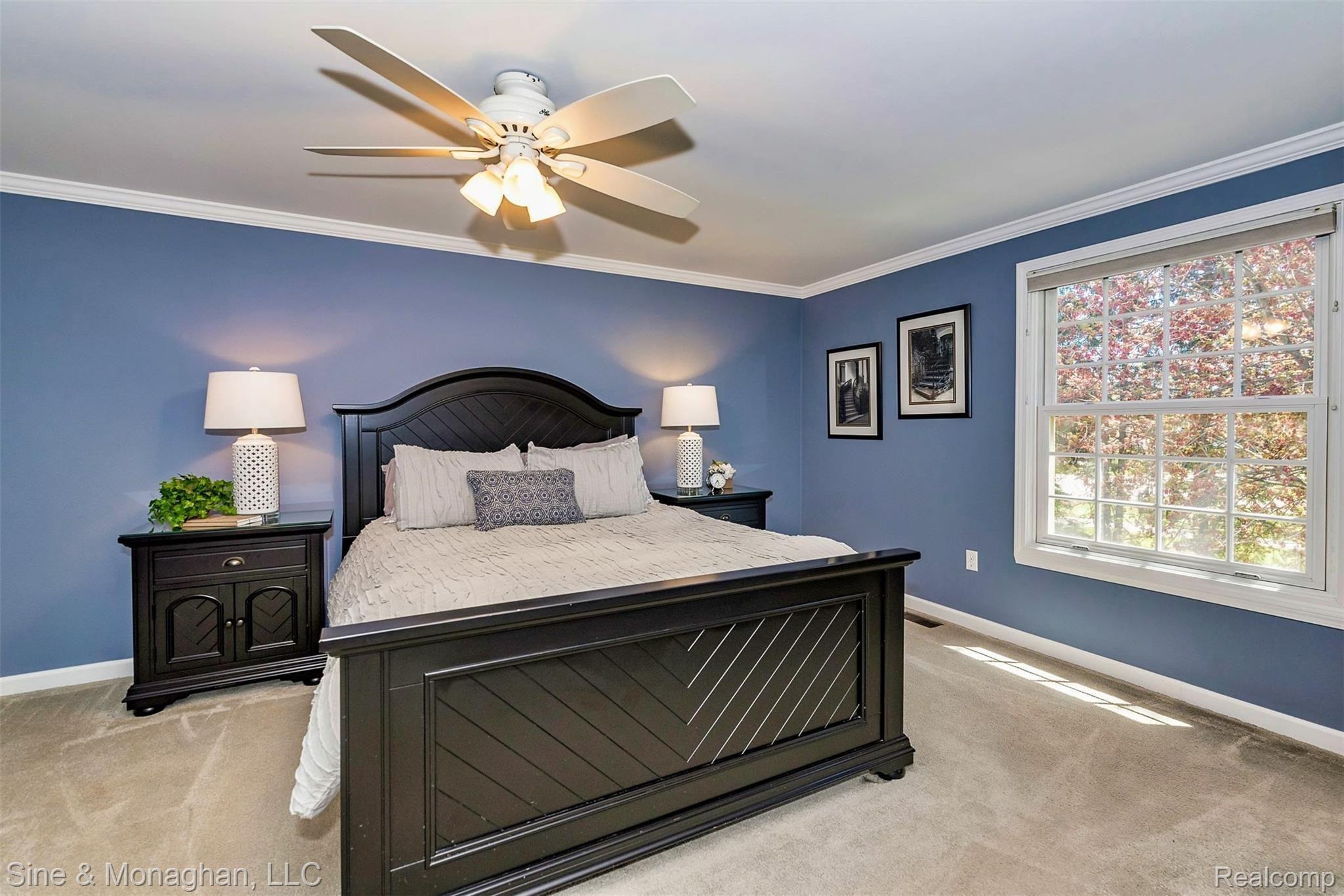 531 Shellbourne Drive Rochester, MI 48309 - Photo 26 of 51 Master bedroom with crown moulding, neutral carpet